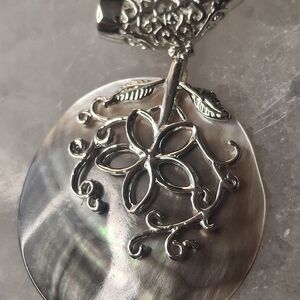Silver Floral Pendant with Iridescent Shell